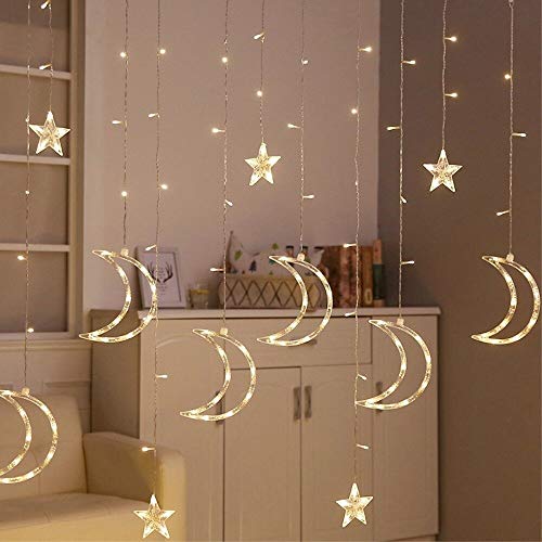 A cozy room adorned with a delicate string of stars and crescents, creating a whimsical and enchanting atmosphere.
