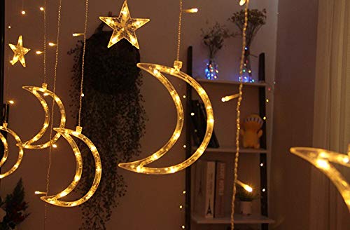 An enchanting room featuring a decorative string of stars and crescents suspended above, enhancing the ambiance.
