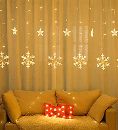 A room with a white wall adorned by a hanging snowflake. A serene and wintry ambiance fills the space.
