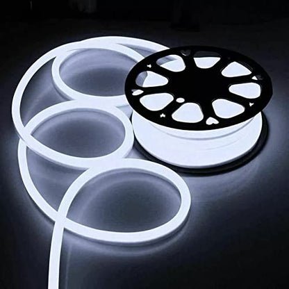  A reel of white light beside a traditional film reel, symbolizing the fusion of modern and classic cinema.