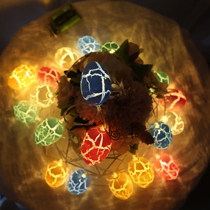 A flower arrangement with colorful lights on top