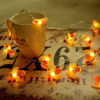 A cup with colorful lights shining on it.