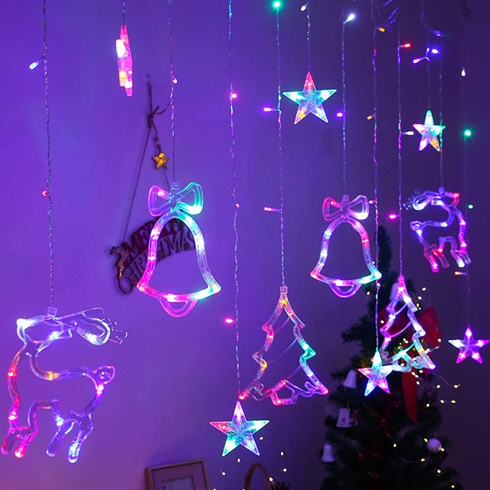 Christmas-themed room with festive decorations and lights.