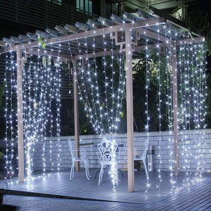  White curtain with twinkling lights draped elegantly, creating a magical ambiance.