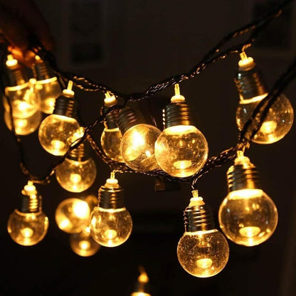 String of light bulbs and lights intertwined, creating a glowing display.