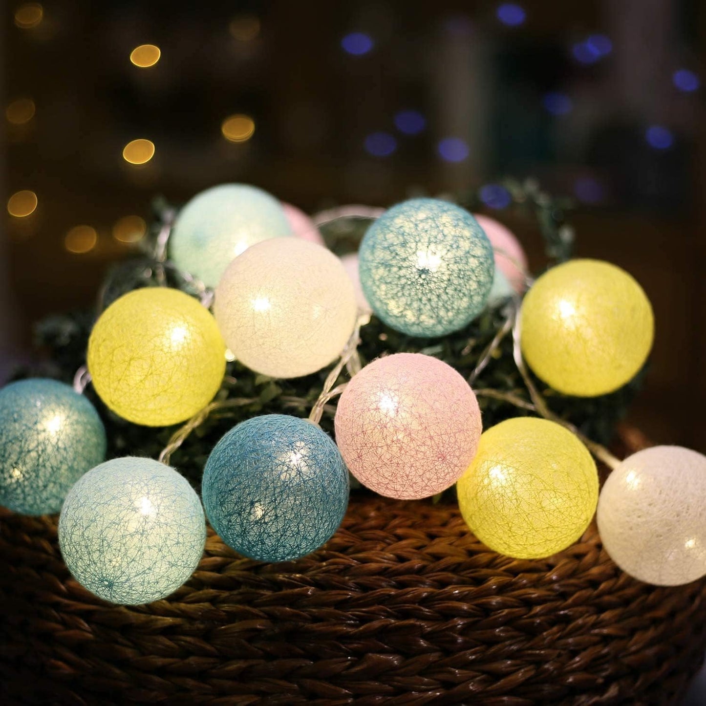 Wall adorned with colorful ball string lights, enhancing the ambiance of the space.