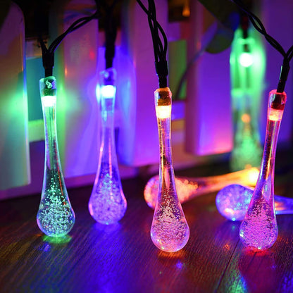  Solar LED light string lights adding a magical touch to the garden.