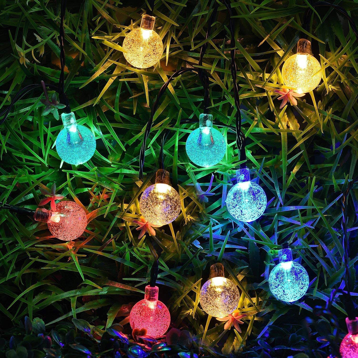 Festive lights coiled around a vase, adding a pop of color to the room.