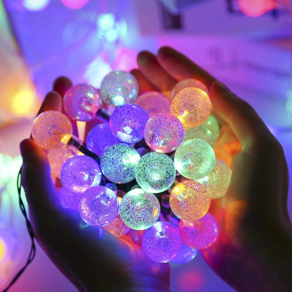  Colorful lights wrapped around a vase, creating a festive and vibrant display.