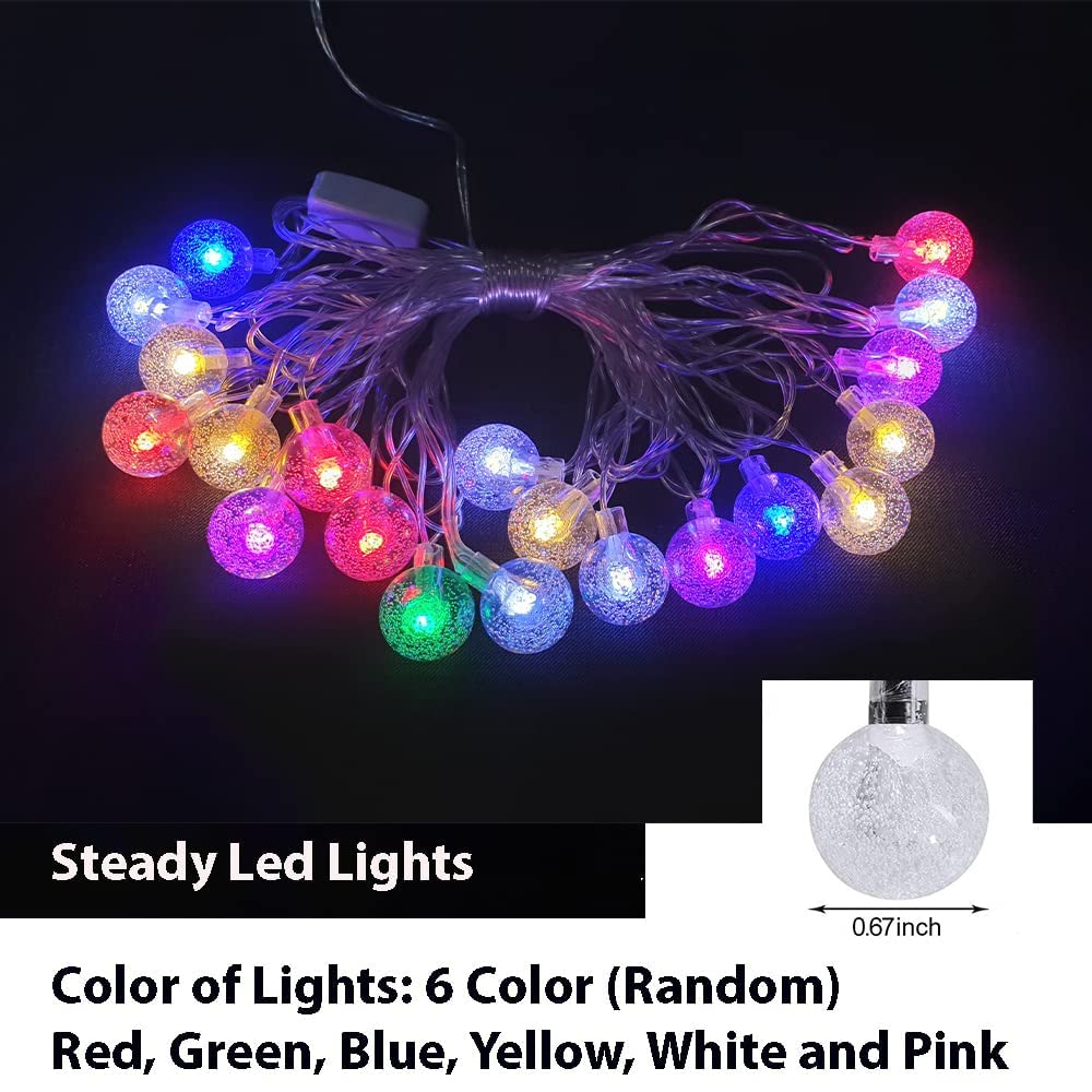 A string of colorful lights illuminating a vase, adding a festive flair to the decor.