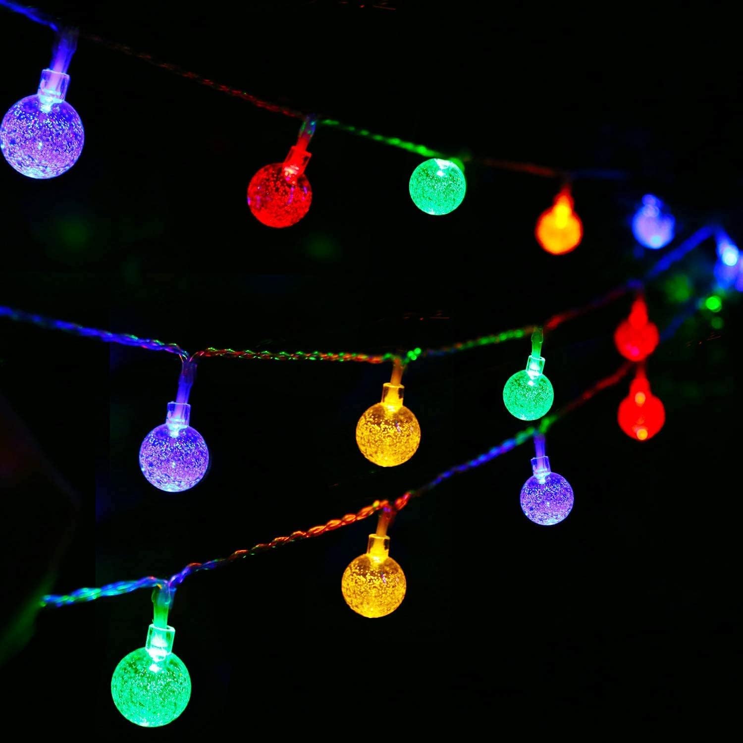 Vibrant lights coiled around a vase, adding a pop of color to the room.
