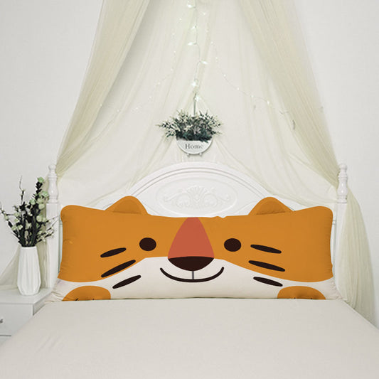  A cozy bed with a pillow featuring a cute Tiger face design.