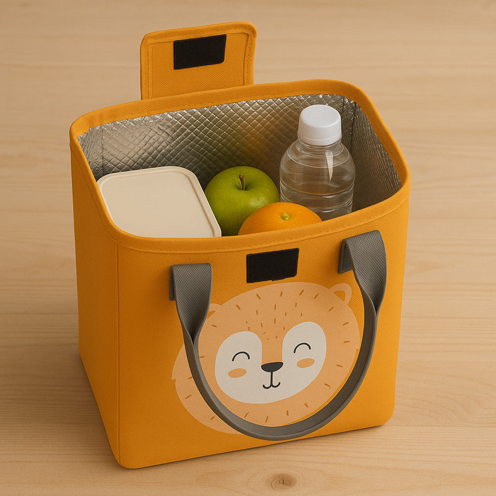 Yellow colour lunch bag with a fox design, containing food items and a bottle, on a wooden surface. Best lunchbag for kids as well as adult
