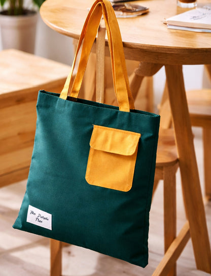 Aesthetic Green tote bag with a yellow pocket and very useful tote bag for everyday needs