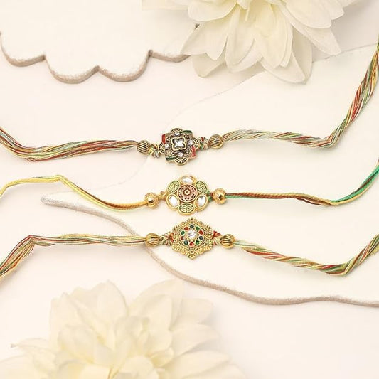 Three colorful rakhi's with a beautiful flower design. Perfect for celebrating the bond of love and protection.