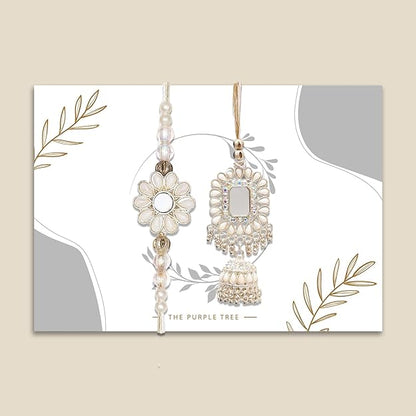 Two beautiful gold rakhi with red accents, perfect for celebrating the bond of love and protection.