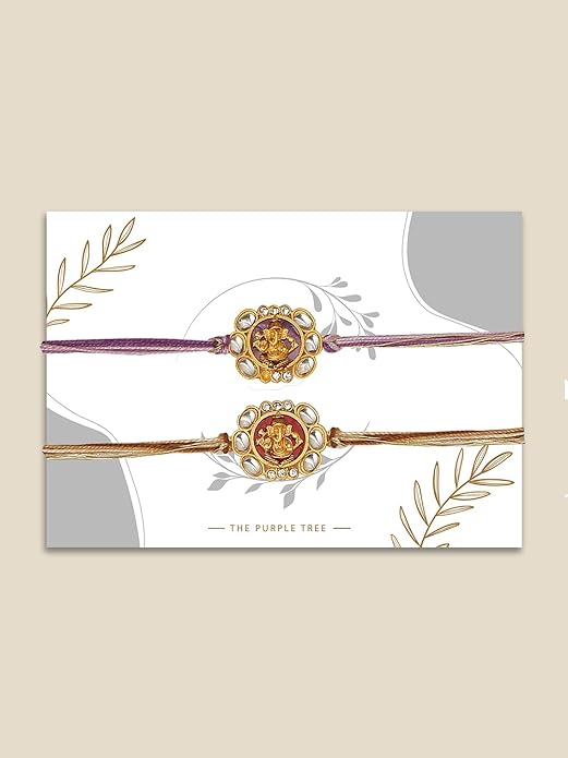 Two rakhi with gold and purple beads, symbolizing love and protection during the special occasion of Raksha Bandhan.