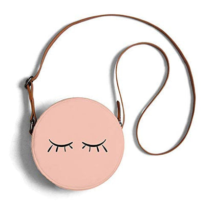 Round sling bag in pink with cute eyelash print overview