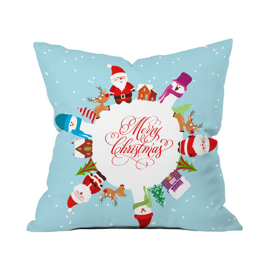 A festive Christmas pillow featuring Santa Claus surrounded by cheerful snowmen, adding holiday spirit to any decor.