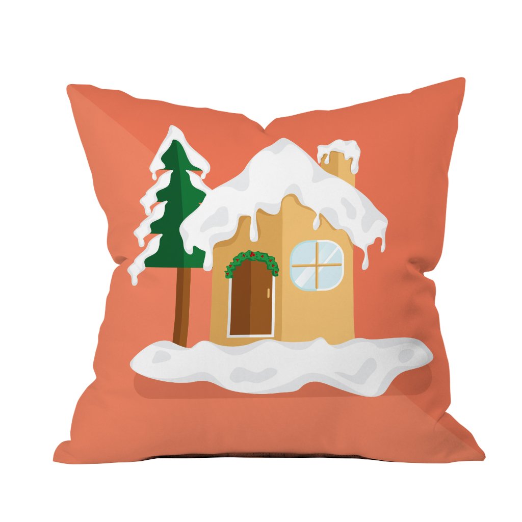 A cozy pillow featuring a charming house design, surrounded by soft snowflakes for a wintery touch.