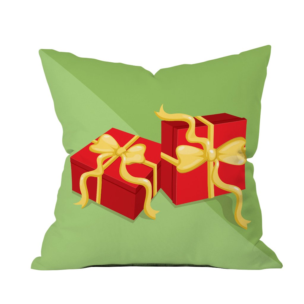 Two vibrant red presents resting on a soft green pillow, creating a festive and cheerful atmosphere.
