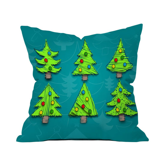 A decorative pillow featuring four festive Christmas trees in a charming design.

