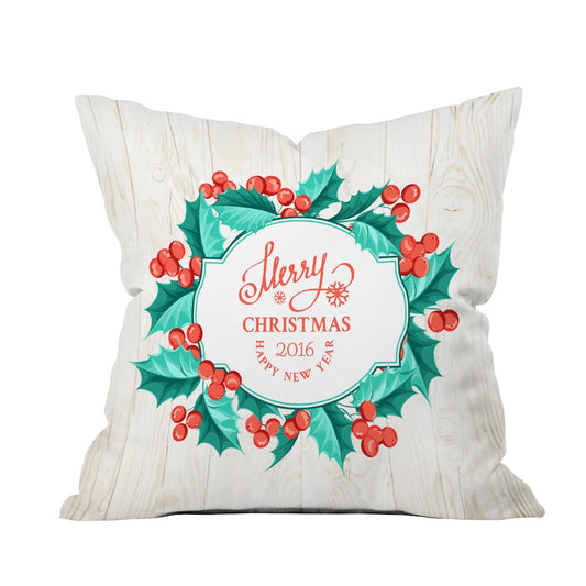 A decorative throw pillow featuring a festive Christmas wreath design, perfect for holiday home decor.