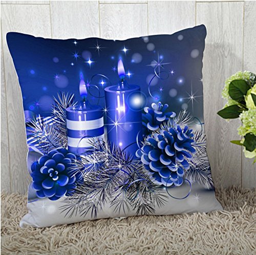 A cozy blue Christmas pillow surrounded by glowing candles and festive pine cones, perfect for holiday decor.