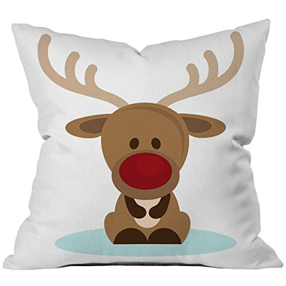 A decorative cushion adorned with a delightful reindeer, ideal for holiday decor or a cozy living room.
