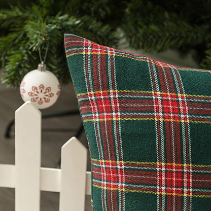 Two decorative pillows with trendy plaid patterns, ideal for snuggling up on the couch.