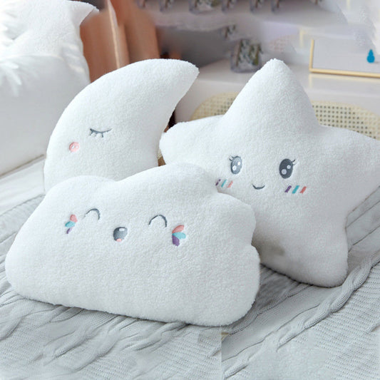 Three white pillows with cute faces and fluffy clouds. Perfect for a cozy and dreamy atmosphere.