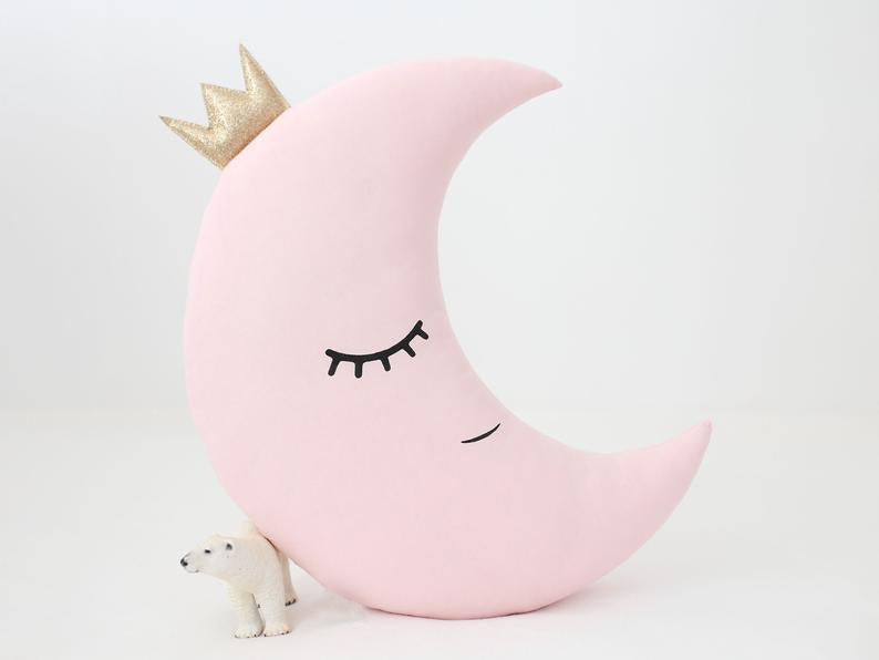 Trio of pillows adorned with a charming moon and cloud motif, ideal for enhancing the cozy atmosphere of your space.
