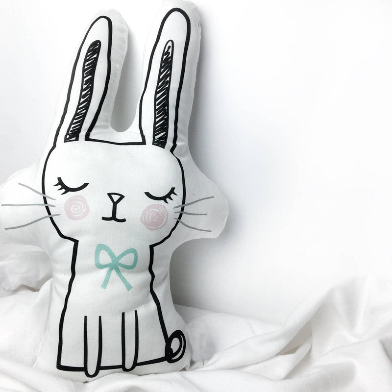 A cute stuffed animal with a bow on its head, ready to bring joy and comfort to anyone who cuddles with it.