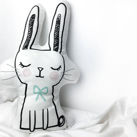 A cute stuffed animal with a bow on its head, ready to bring joy and comfort to anyone who cuddles with it.