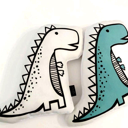 A whimsical pillow adorned with a playful dinosaur pattern, great for adding a pop of personality to your space.