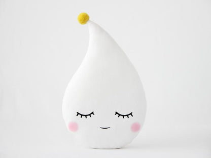  Quirky white pillow featuring eyes and a yellow dot, a fun addition to any room in your house.