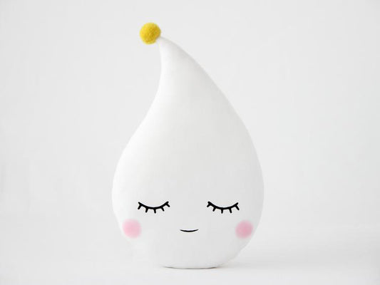  Quirky white pillow featuring eyes and a yellow dot, a fun addition to any room in your house.