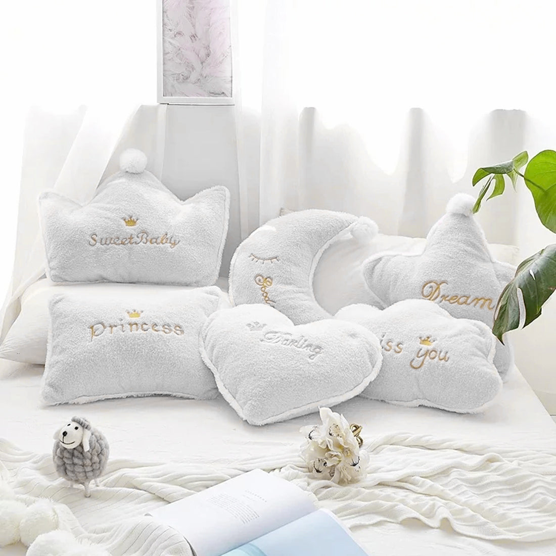 Elegant white pillow adorned with the word "darling," ideal for enhancing the aesthetic of your living space.