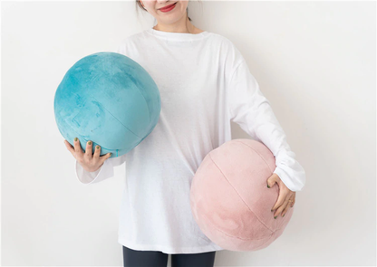 Assorted balls on clean white surface.