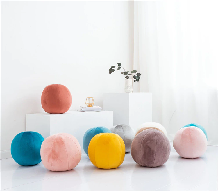 Vibrant balls on clean white surface.