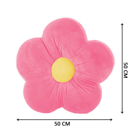 A pink flower-shaped cushion with a yellow center, adding a touch of elegance and comfort to any space.