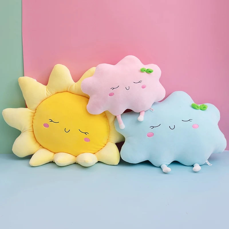 2. Tabletop view of a cute blue cloud pillow, a fun and cozy addition to any room.