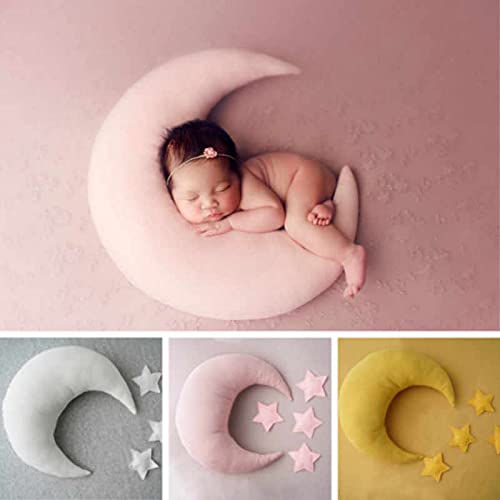 A peaceful newborn girl sleeping on a blue moon, surrounded by tranquility and innocence.