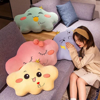 3. Cute pink cloud pillow resting on a table