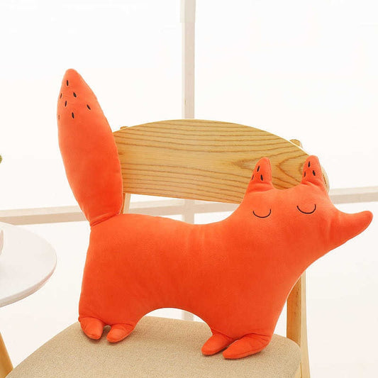A Chinese-themed stuffed animal sitting on a chair, showcasing cultural elements and vibrant colors.