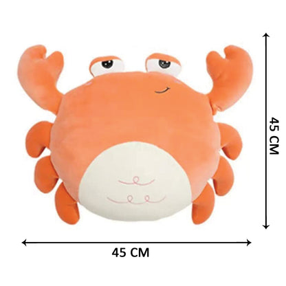 A cute stuffed crab toy on a white background.