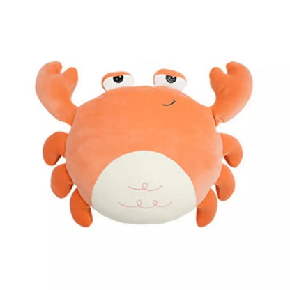A stuffed crab on a white background - a cute and cuddly toy resembling a crab, placed on a plain white surface.