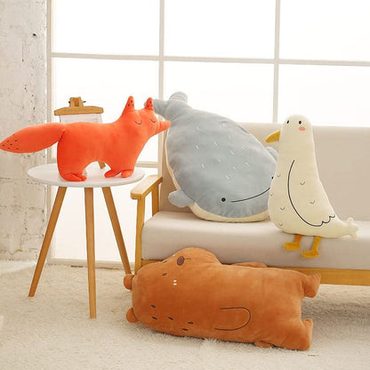  Colorful plush toys of cute cartoon animals for kids to cuddle and play with.