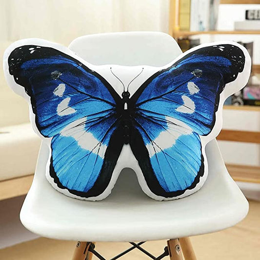 Blue and white butterfly-shaped pillow, perfect for adding a touch of whimsy to your home decor.