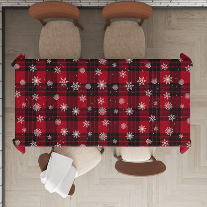  Red plaid Christmas tablecloth adorned with delicate snowflake patterns.